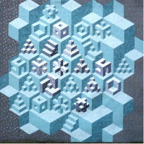 Bamboozled 3D quilt pattern by Little Patch Pockets featuring geometric Foundation Paper Pieced blocks in blue and white