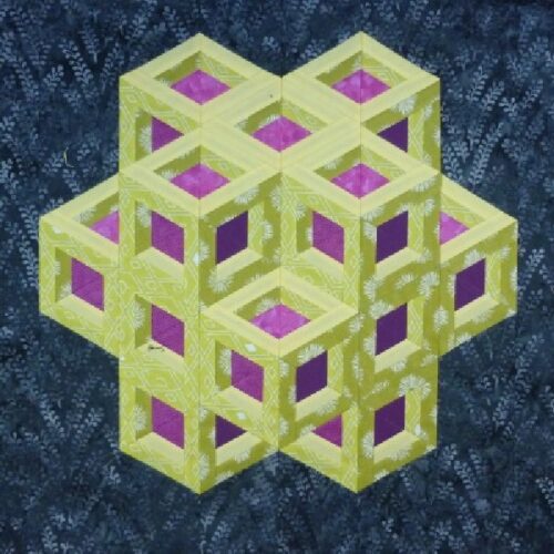 Block Party quilt pattern by Little Patch Pockets featuring a 3D geometric cube design in lime green, purple and blue fabrics